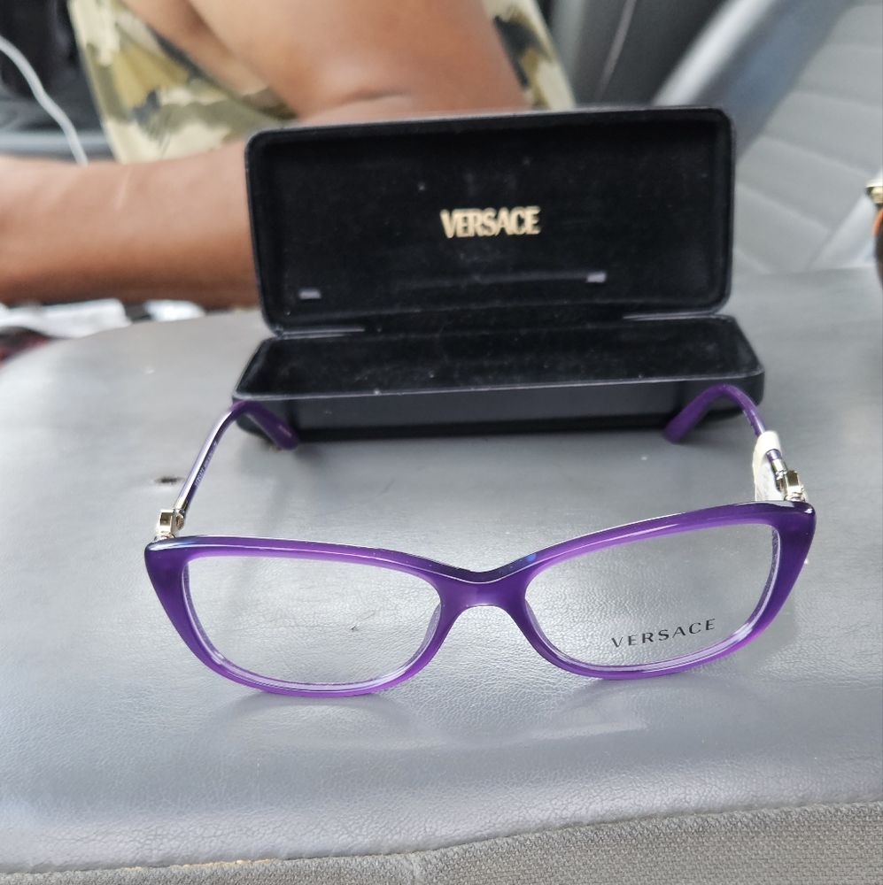 Versace eyeglasses Brand new tag still on them, purple,non prescription lenses.